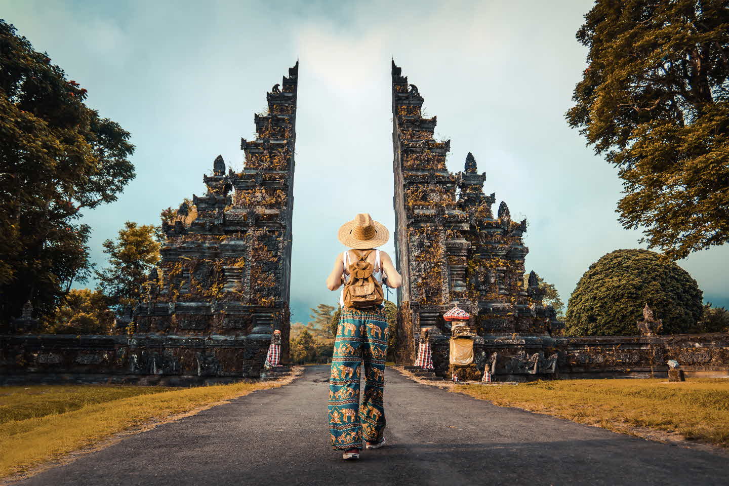 woman-with-backpack-exploring-bali-indonesia-ZCU9XET